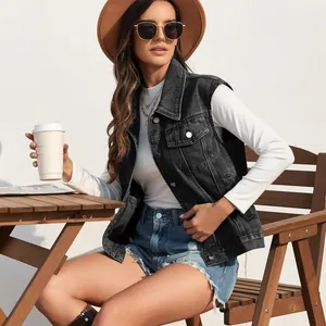 Stylish washed black denim vest for women worn in a cozy outdoor cafe lifestyle setting