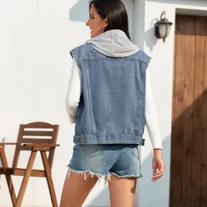 Back view detail of a classic washed denim vest for women with casual hooded style.