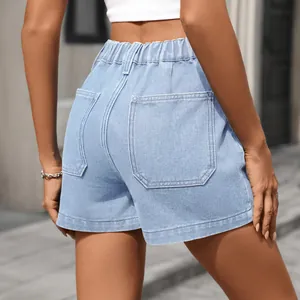 Back detail view of light blue washed denim shorts featuring elastic waist and large pockets.