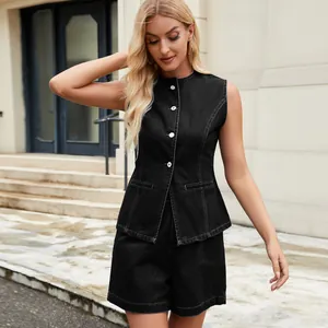 Full view of elegant black sleeveless denim vest and matching shorts set worn by a model