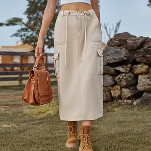 Detailed view of beige washed cargo denim maxi skirt with drawstring waist design