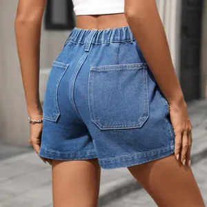 Back view of women's blue denim shorts featuring elastic waist and dual back pockets
