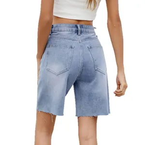 Women's light blue washed straight-leg denim shorts with raw hem, casual summer style.