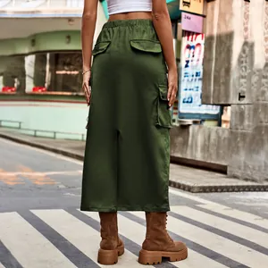 Detailed back view of army green denim cargo midi skirt with utility pockets and slit