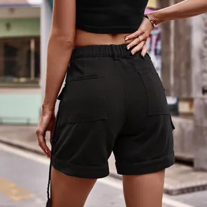 Back view detail of black American style denim cargo shorts with elastic waist and pockets