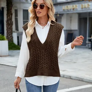 Vintage cable-knit V-neck sweater vest in brown styled with a white button-down shirt