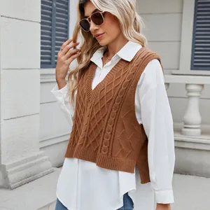 Stylish brown cable-knit V-neck vest styled over a white shirt for a chic autumn look