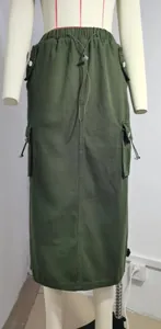 Detail of army green denim cargo skirt with functional drawstrings and side pockets