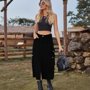 Full length view of a black denim cargo maxi skirt styled for a casual outdoor look