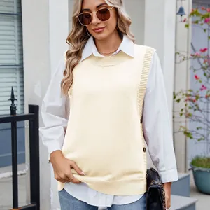 Casual cream knitted vest featuring side button closure and stylish split hem detail.