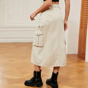 Back view detail of beige denim cargo midi skirt with elastic waist and pockets