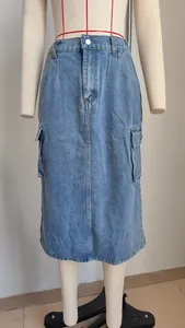 Detailed view of a washed blue cargo denim midi skirt with side pockets on a mannequin