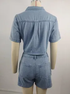 Back view of a light blue washed denim two-piece set featuring shorts and short sleeves.