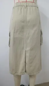 Back view of a khaki cargo denim midi skirt with elastic waist and center slit