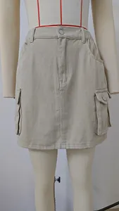Front view of khaki washed denim cargo mini skirt with multi-pockets on a mannequin