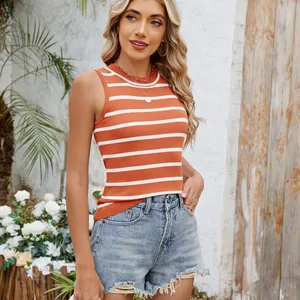 Close-up detail of a vintage style orange and white striped slim fit knitted tank top