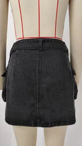 Detailed back view of a washed black denim cargo mini skirt displayed on a mannequin