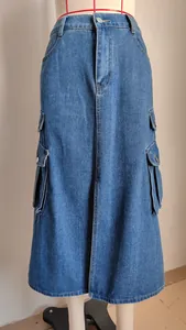Detailed view of blue denim cargo midi skirt with large side pockets and stitching.