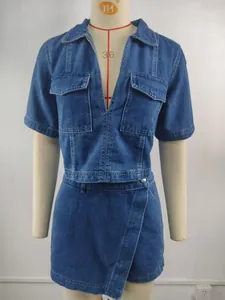 Detail view of blue V-neck short sleeve washed denim two-piece set on mannequin