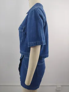 Side profile of a stylish washed blue denim set with V-neck top and irregular skirt