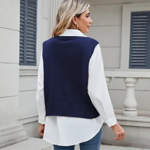Back view showing the texture of a navy blue oversized V-neck knit sweater vest for women