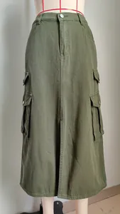 Detailed view of an olive green cargo maxi skirt with front split and large pockets