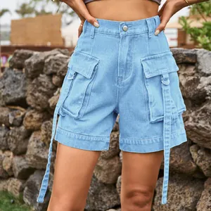 Detail view of light blue denim cargo shorts featuring utility pockets and straps