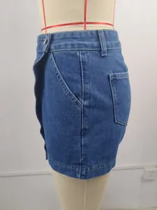 Close-up of blue wash denim skirt side detail on mannequin