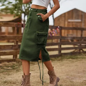 Close-up of a dark green denim cargo midi skirt with side pocket and drawstring detail