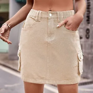 Stylish khaki denim cargo mini skirt featuring elastic waist and side flap pockets