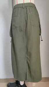Back view of army green cargo midi skirt with elastic waist and center slit detail