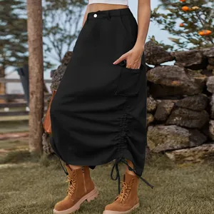 Close-up detail of black cargo midi skirt with drawstring ruched design and side pockets