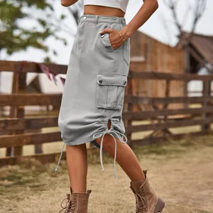 Detailed side view of a grey cargo midi skirt featuring drawstring hem and large pockets