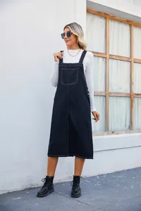 Stylish mid-length black denim pinafore dress with functional front pocket detail for women