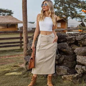 Stylish vintage khaki denim cargo midi skirt featuring large side pockets and high waist
