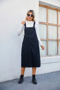 Women's chic black denim overall midi dress with a front pocket and button accents