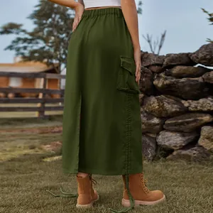 Detailed back view of an olive green denim cargo maxi skirt with a functional side pocket