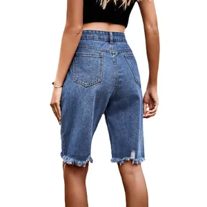 Stylish high-waisted denim bermuda shorts featuring distressed details and a raw frayed hem