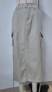 Frontal view showing texture details of khaki cargo denim midi skirt on mannequin