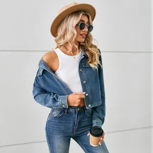 Stylish washed blue cropped denim jacket for women with long sleeves and buttons.