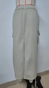 Detailed back view of a khaki cargo maxi skirt with a split hem shown on a mannequin