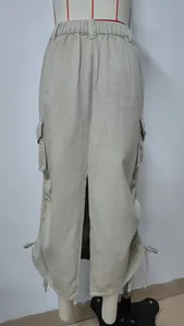 Detail view of khaki cargo midi skirt featuring back slit and adjustable drawstring hem