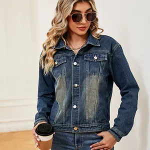 Casual washed blue denim jacket with metal buttons and classic collar detail view