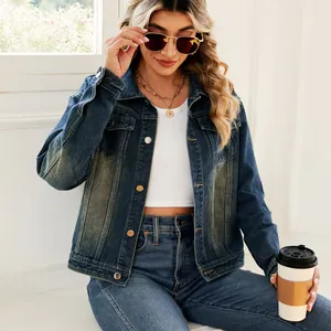 Women's vintage wash blue denim jacket with distressed details and metal buttons