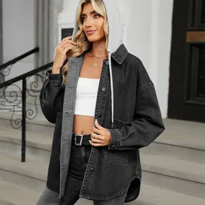 Detail view of a stylish washed black loose denim jacket with a contrast grey hood for women.