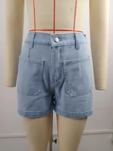 Close-up detail of high-quality light blue washed denim shorts featuring large front pockets