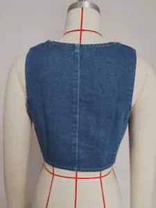 Back view of retro washed blue denim vest showing slim fit waist and stitching details