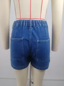 Back view of blue denim shorts showing elastic waistband and pockets detail