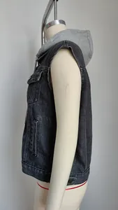 Side view of women's washed dark grey denim vest with a grey jersey fabric hood