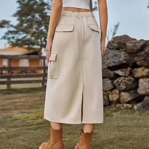 Back view of a beige cargo denim skirt with pockets and a back slit detail